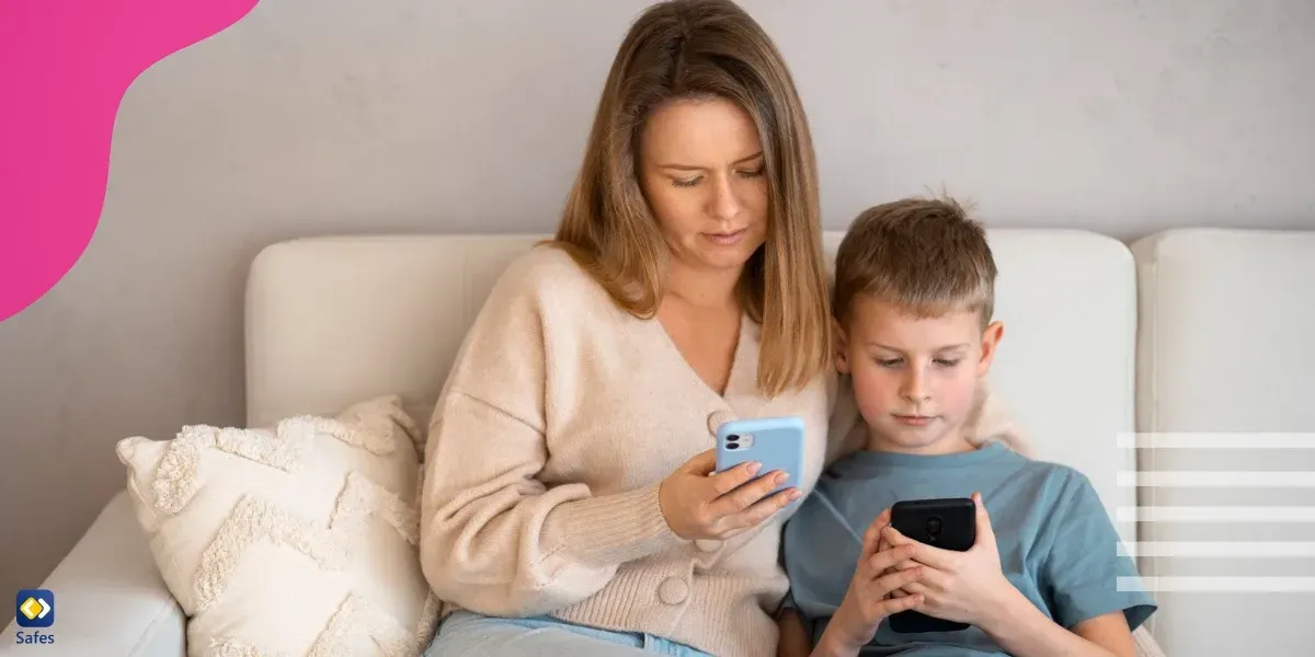 Mother and son sitting on couch looking at their phones