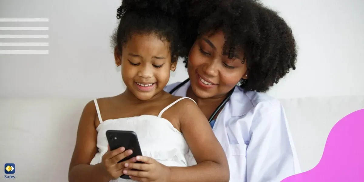 Girl sitting on mother’s lap looking at phone